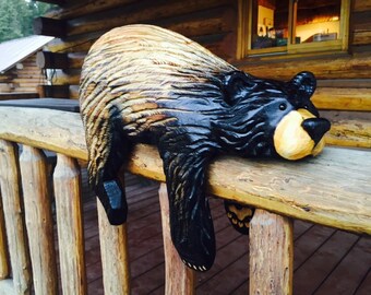 Chainsaw carved rail bear