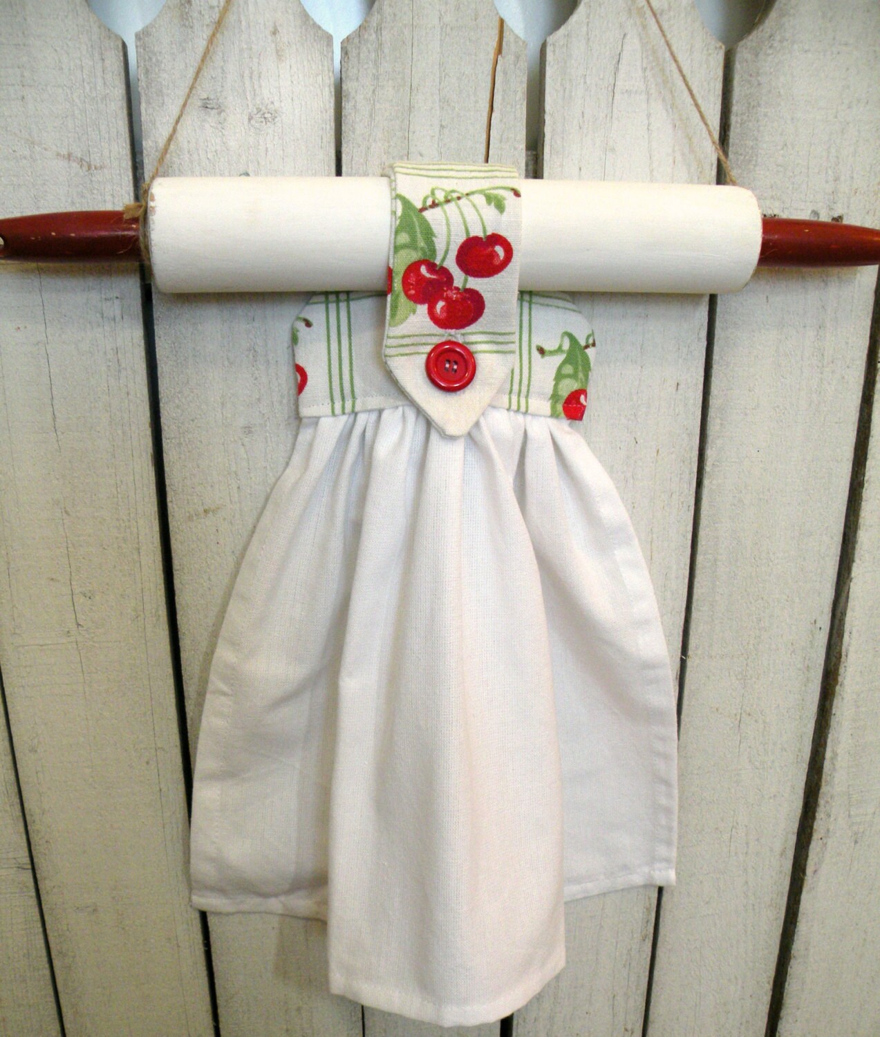 Retro red and white Rolling Pin towel holder with vintage