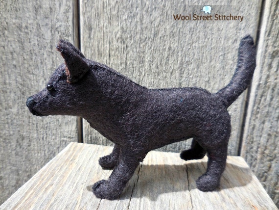 black soft toy dog