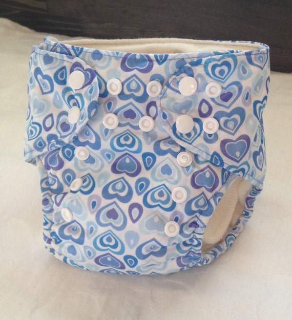 One size Canadian made cloth diaper with snap closure and pul outer shell. Single. Sweetheart Skies.