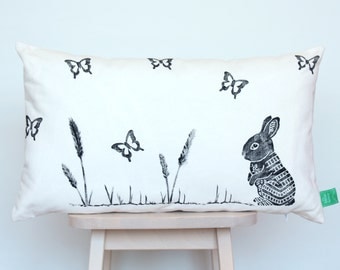 Cushion cover with rabbit and butterflies, hand-stamped