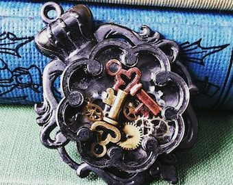 Key and gear pendant