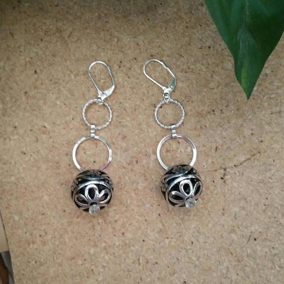 Items similar to Silver Filigree Ball and Chain Earrings on Etsy