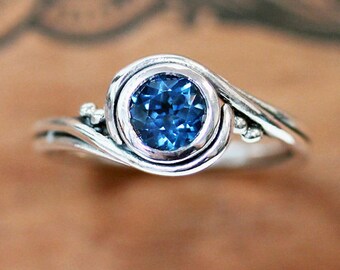 London blue topaz ring silver, alternative engagement ring, swirl ring, bypass ring, recycled silver ring eco friendly ring pirouette custom