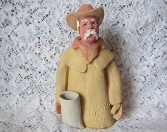 Vintage Cowboy Pottery Sculpture signed by sculptor