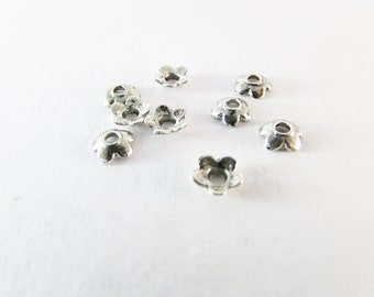 D-03209 - 20 Bead Caps 6,5mm ant. Silver color