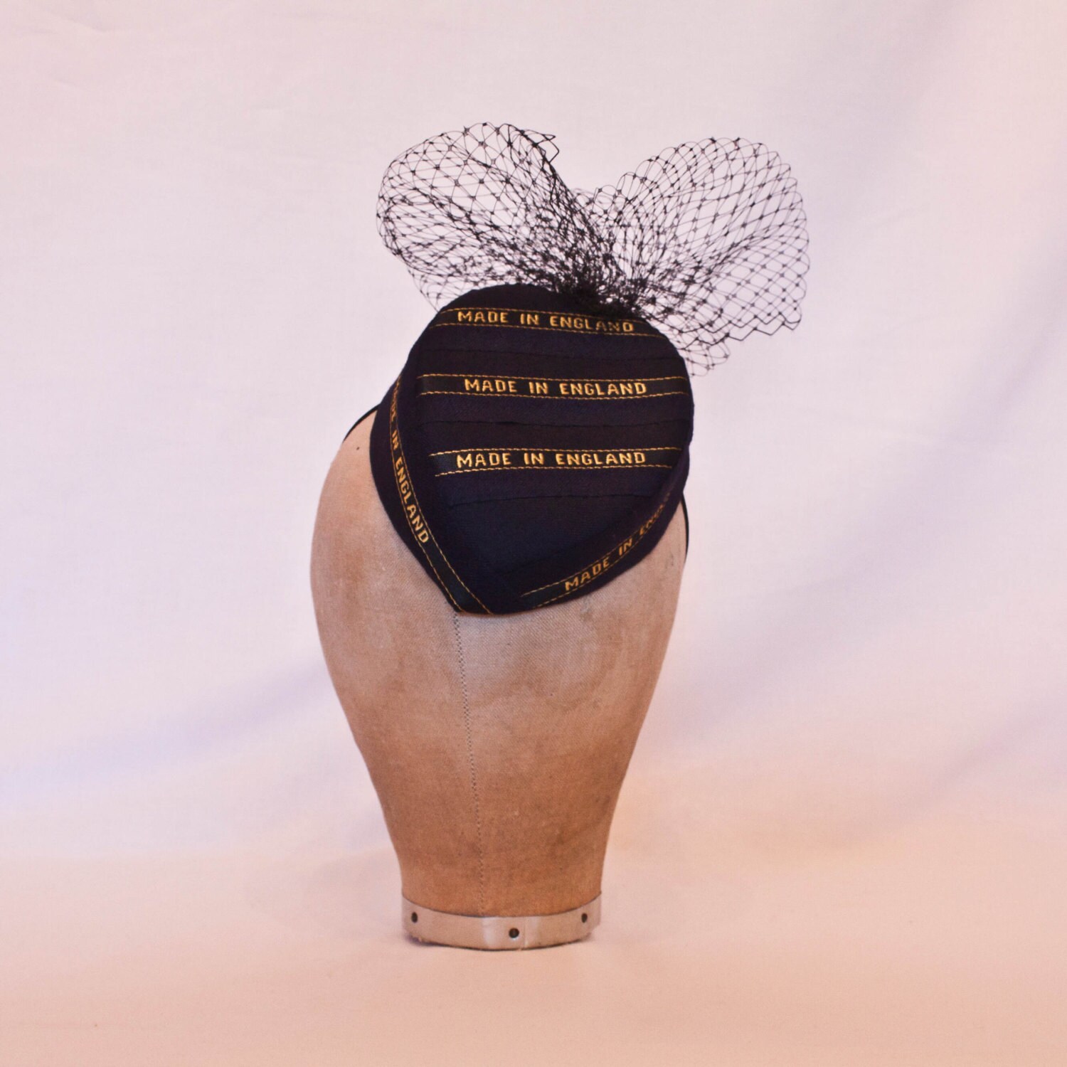 Unique handmade ladies hat using Savile Row British wools displaying ‘Made in England’ selvedge