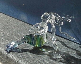 Glass mermaid sculpture