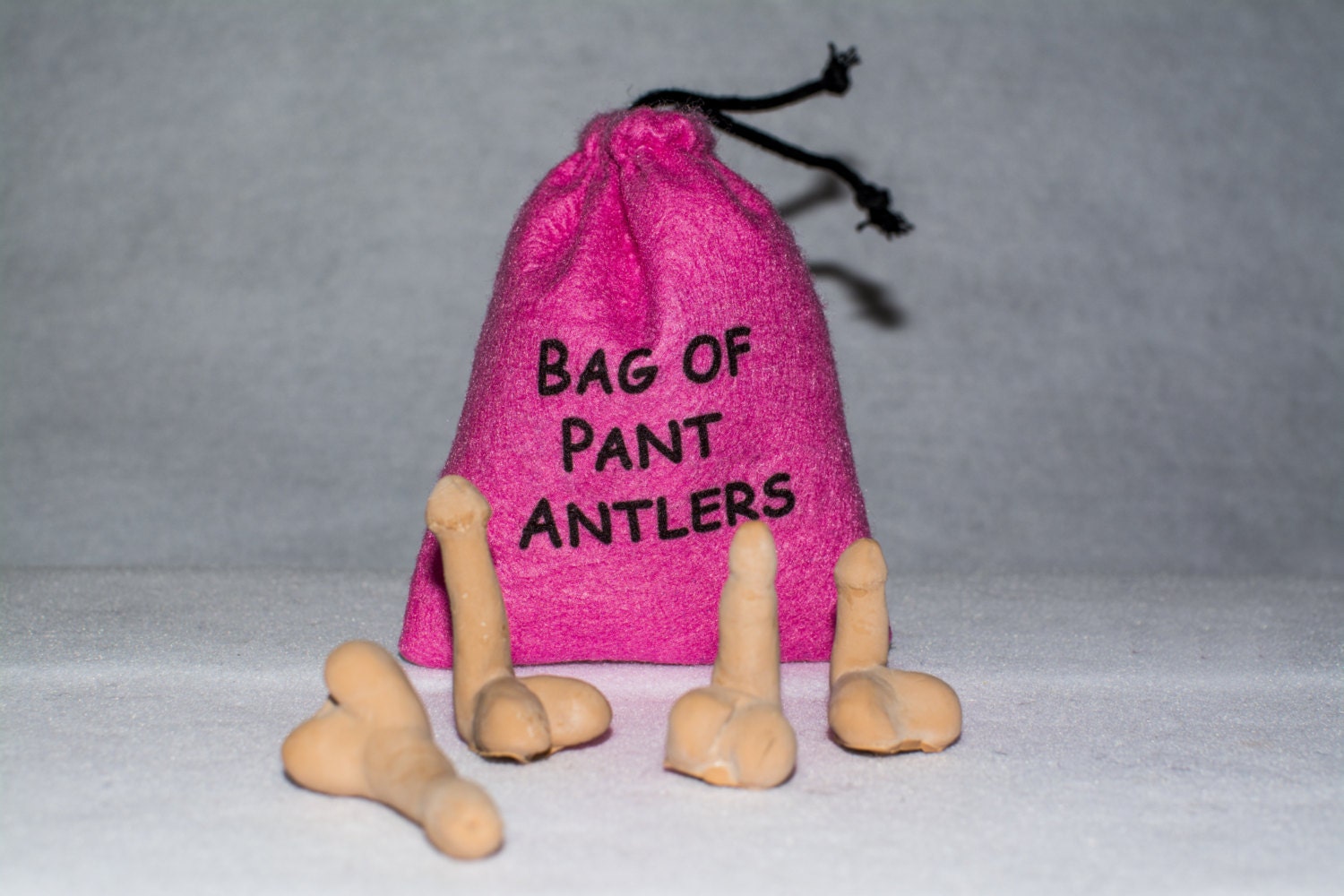 Bag Of Pant Antlers 4 Miniature Latex Cocks In A Premium