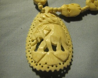 Vintage Carved bone elephant necklace