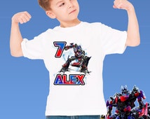 Lot T-shirt Transformers Rouge + Puzzle 100 Pièces Barricade - Taille 10/12 Garçon - Occasion Très Bon état
