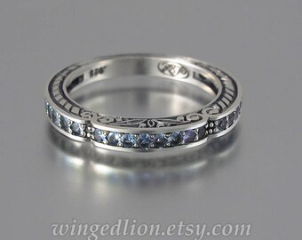 CARYATID wedding band in sterling silver with Alexandrites half-eternity band