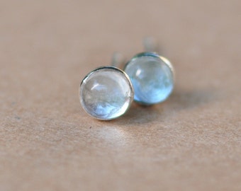 Aquamarine Earring Studs. 4mm Clear Aquamarine gemstones set in sterling silver.