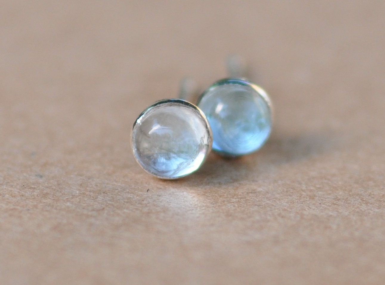Aquamarine Earring Studs. 4mm Clear Aquamarine gemstones set