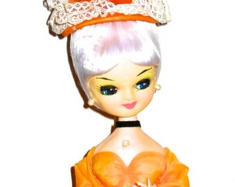 Vintage 60s pose doll big eyes yellow dress display