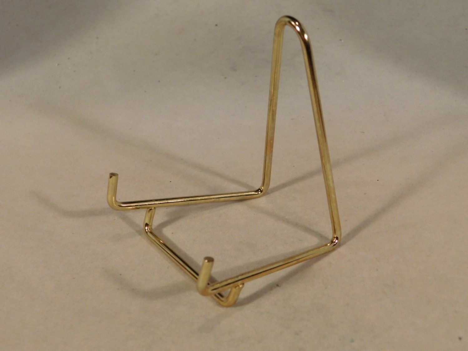 A SMALL Brass Easel Display Stand for Plates Fossils and