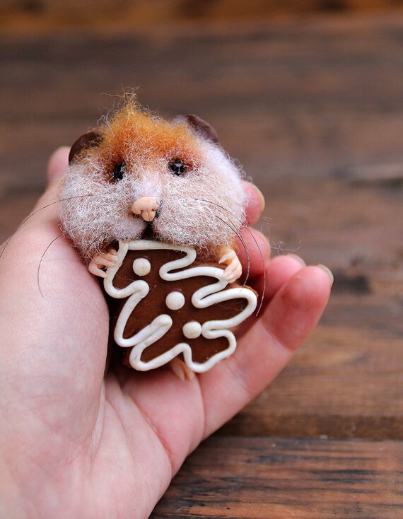 Needle felt realistic hamster with christmas gingerbread