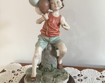 70's Vintage Italian Boy figurine with Balloons, made in Italy.perfect condition.