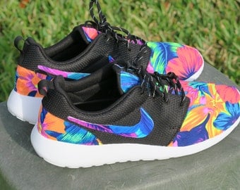blue nike shoes with flowers