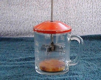 old fashioned hand held food chopper