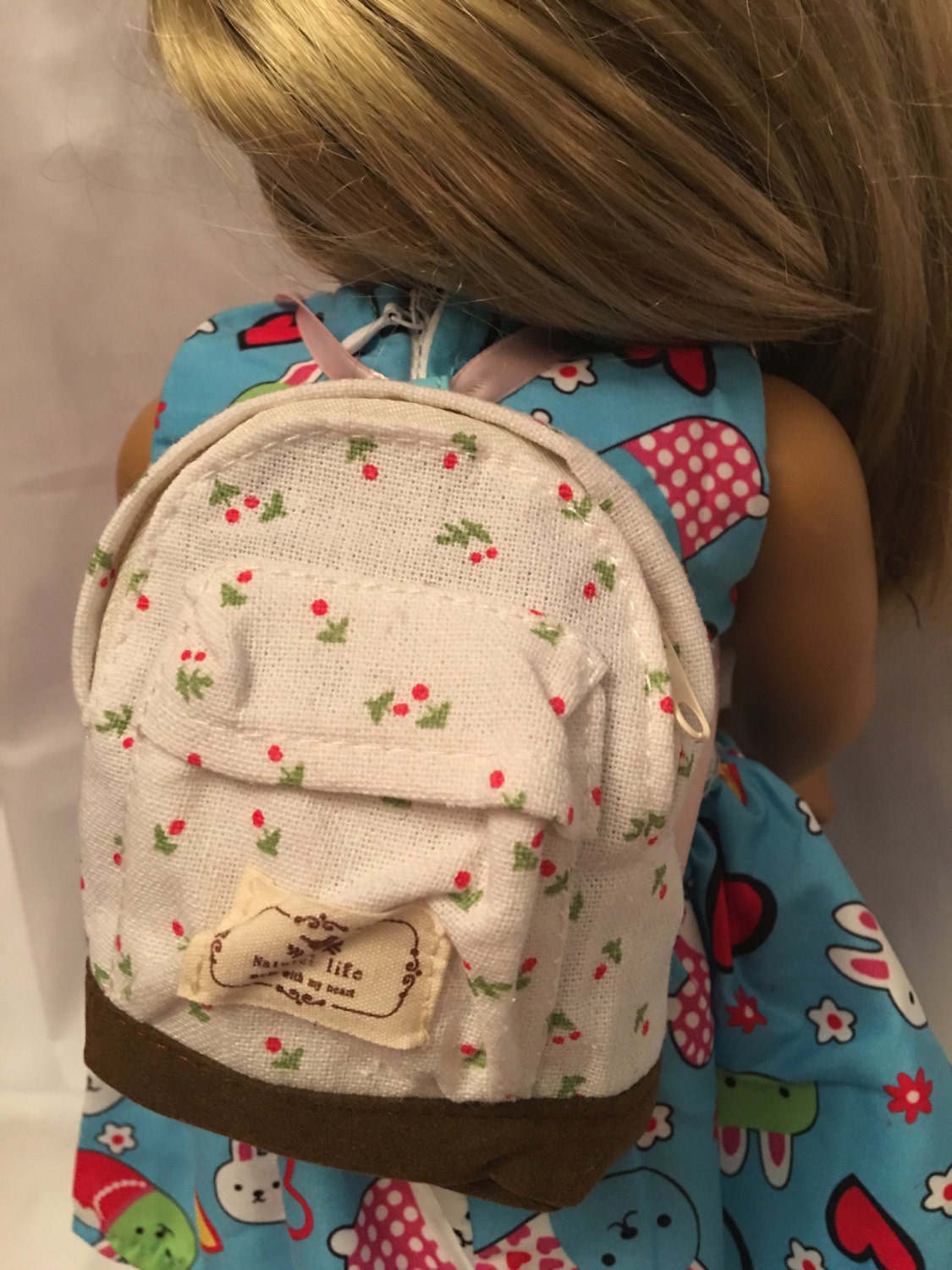 jj doll with backpack