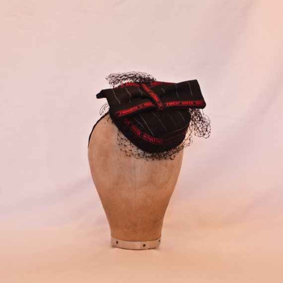Unique handmade ladies hat using Savile Row British wools displaying 'Made in Huddersfield' selvedge