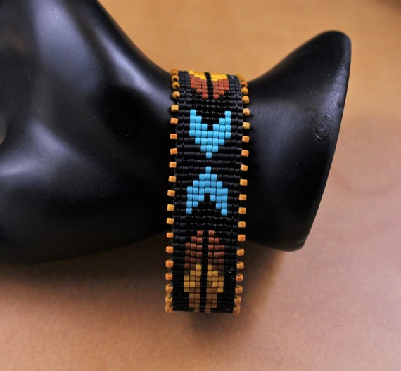 Two Feathers...Native American by CabinFeverBracelets on Etsy