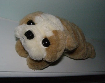 stuffed dog laying down