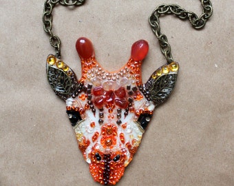 Giraffe-necklaces handmade from stones and beads.
