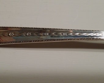 Roseanne pattern round soup spoon circa 1938 silver plate