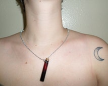 blood vial necklace