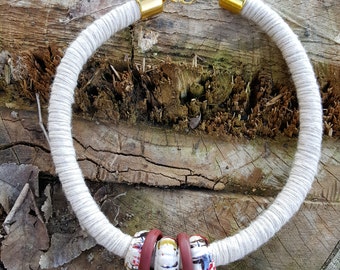 Choker necklace created by using rope climbing beige wool-coated