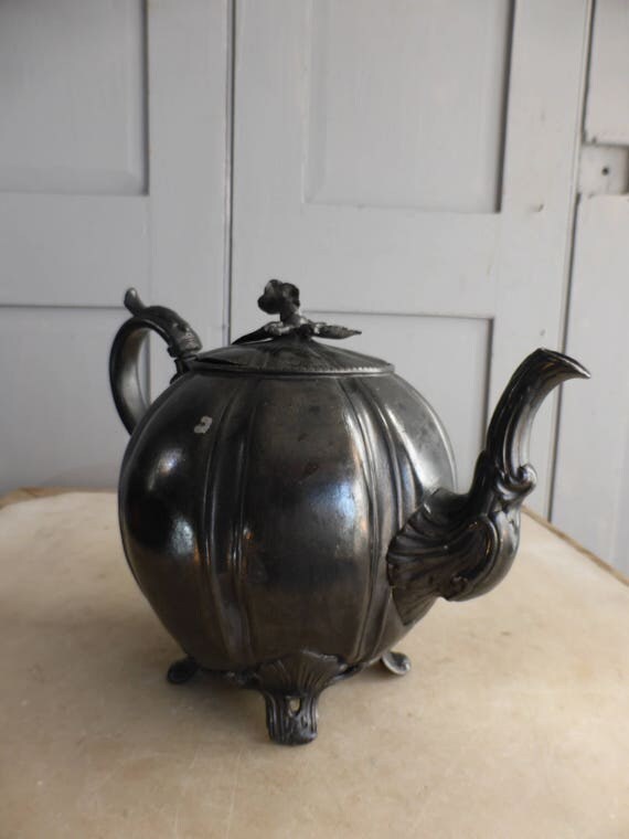Antique decorative pewter teapot by James Dixon & Sons