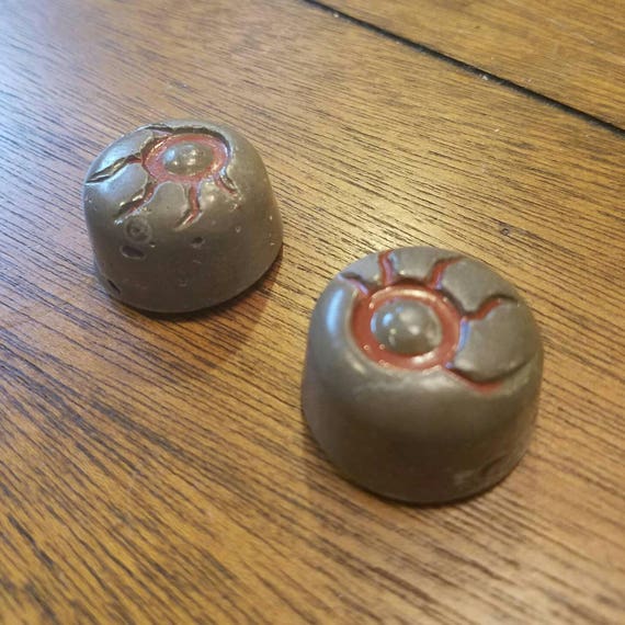 Pair of concrete eye Magnets. Cool, spooky eyeballs.