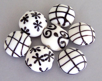 7 black and white beads, lampwork glass, 20mm x 18mm lentil shape, snowflake design