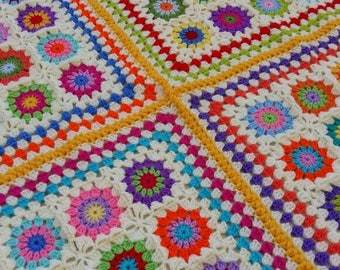 Granny square multicoloured crocheted afghan blanket