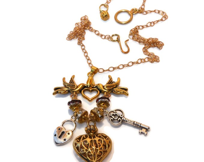 FREE SHIPPING Love charm necklace, pendant dove holder with heart, lock and key Swarovski rounds balls, gold plated chain, charms not plated