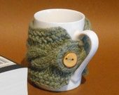 British wool mug cosy / cup cover hand knitted in lichen green wool with wooden button