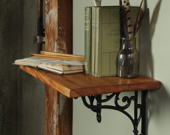 A pair of Vendome shelf brackets
