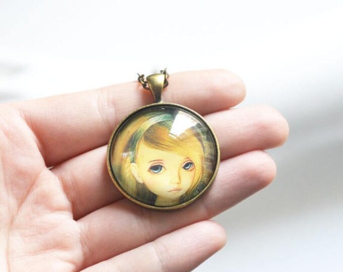 FEMALE IMAGES Round pendant metal brass with the image of girls under glass , Rustic , Vintage, Yellow, Brown, Green
