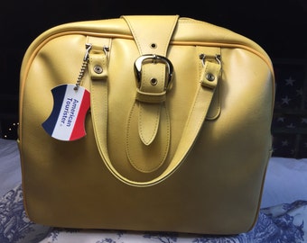 x2 AMERICAN TOURISTER Carry-On