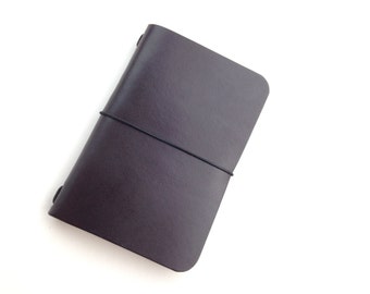 Moleskine Volant Cover. Brown Leather Minimalist Micro Notebook Cover Fits Volant extra small. Includes a notebook.