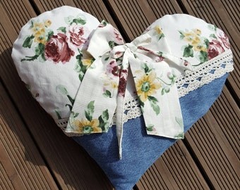 Pillow in heart shape with jeans and roses