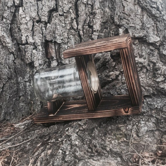 small squirrel feeder with glass jar small squirrel feeder with glass jar