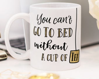 One Direction mug with quote from the song "Little Things" - "You can't go to bed without a cup of tea"