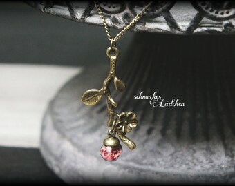 antikronze glass bead necklace with flower branch and real Moss