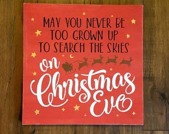 Christmas Sign/May you never be too grown up/to search the