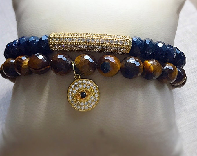 Natural Tigers Eye Beaded Stretch Bracelet with a good luck, lucky, crystal evil eye charm.