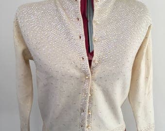 Vintage cream cashmere hand beaded cardigan.