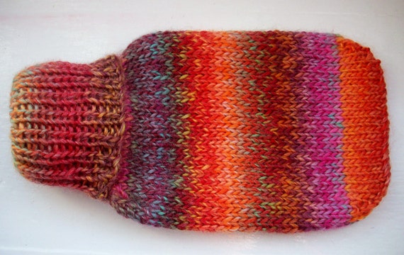 Hot water bottle and hand knitted cozy, hottie cover, medium, variegated orange, amber, pink, burgundy by SpinningStreak